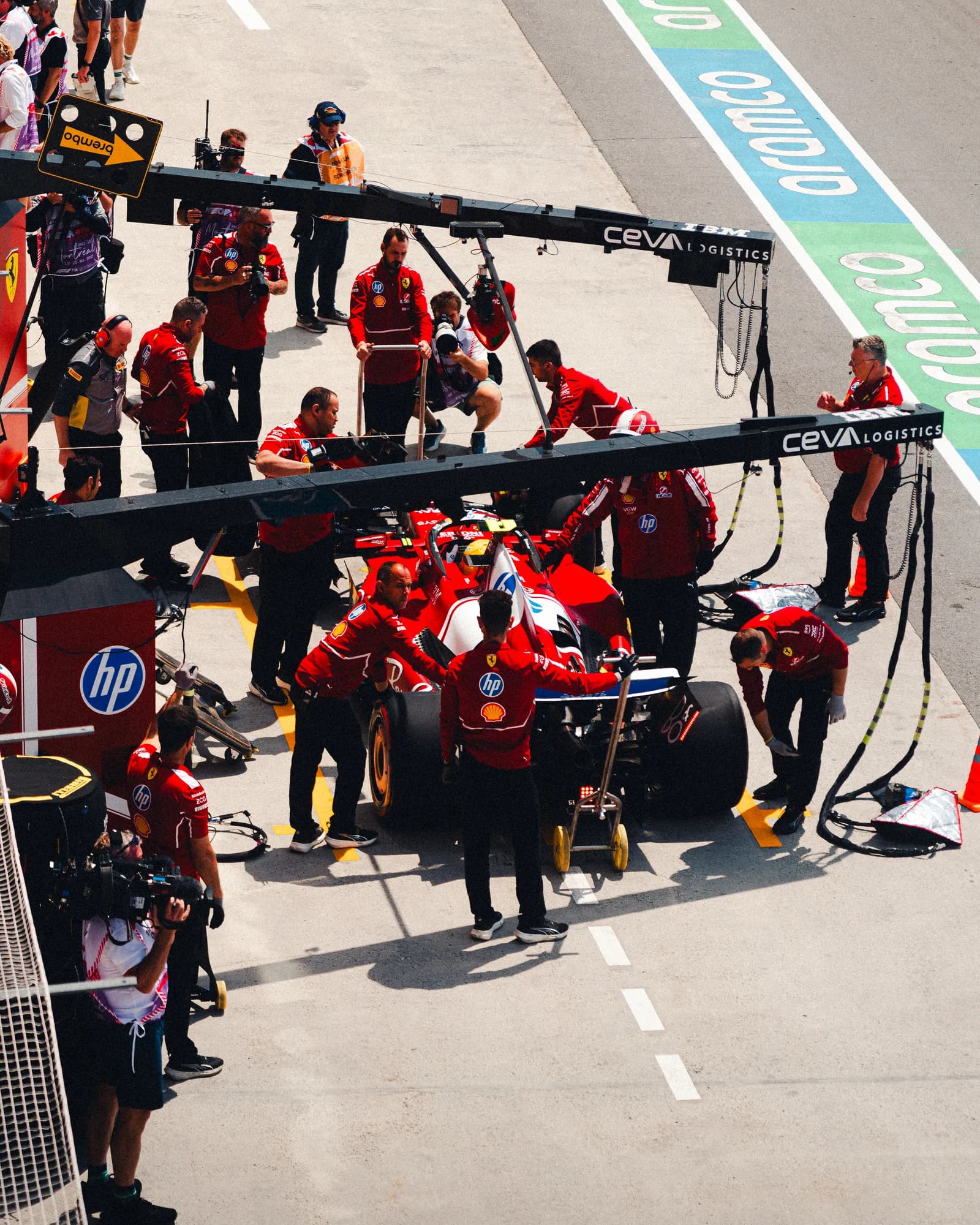 Ferrari pit stop with the crew swarming the car